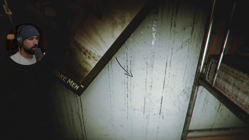 “Screenshot from The Lightkeeper showing the player moving a picture frame to uncover a clue. This interaction highlights the game’s basic mechanics, designed mainly to advance progression rather than deepen suspense. Captured from Hollow’s YouTube walkthrough.”